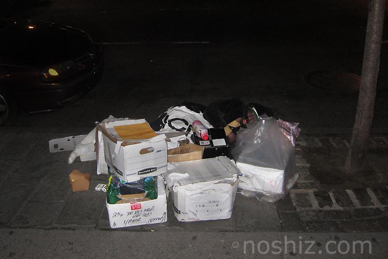 Human in Trash Pile